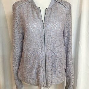 Lauren Conrad Light blue feminine semi sheer zip jacket.
